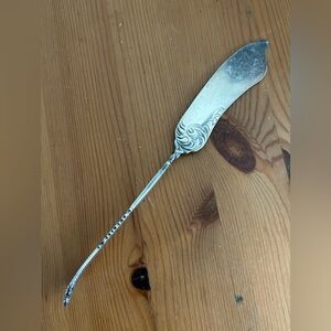 Wm A. Rogers Twisted Handle Butter Knife